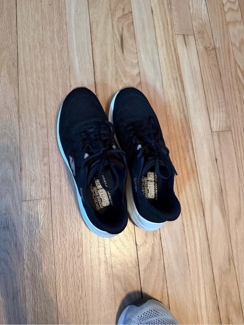 Skechers Women’s Black Athletic Lace-Up Sneakers with White Soles